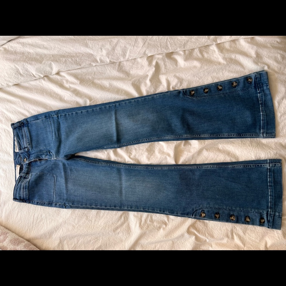 Pilcro high rise flare Jean with button detail. Barely worn in great condition.
